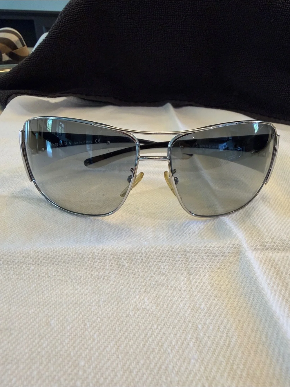 Prada women’s Silver Frame Gray Lens Aviator Sunglasses - Gradient Gray